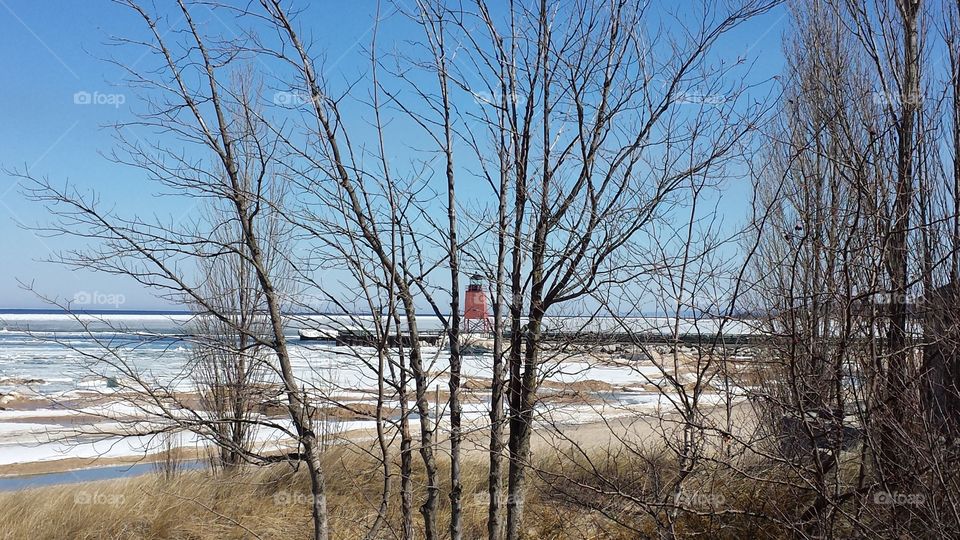 Lighthouse. driving along lake Michigan in Charleviox