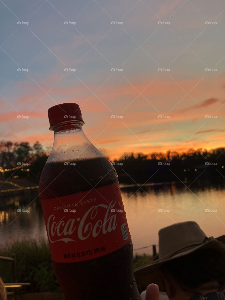 Enjoying my coca-cola while watching the sunset 