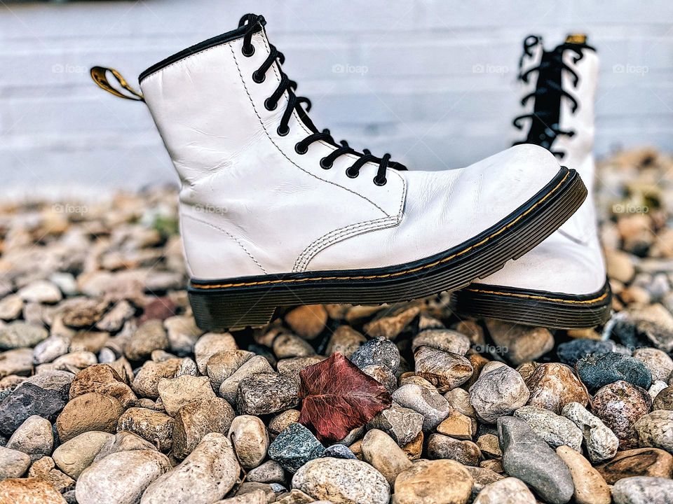 Doc Marten Boots on river rocks, outdoors and boots, Dr. marten boots and nature, boots and natural environment, tough boots, DMs and rocks, boots posed on rocks, outdoor boots 