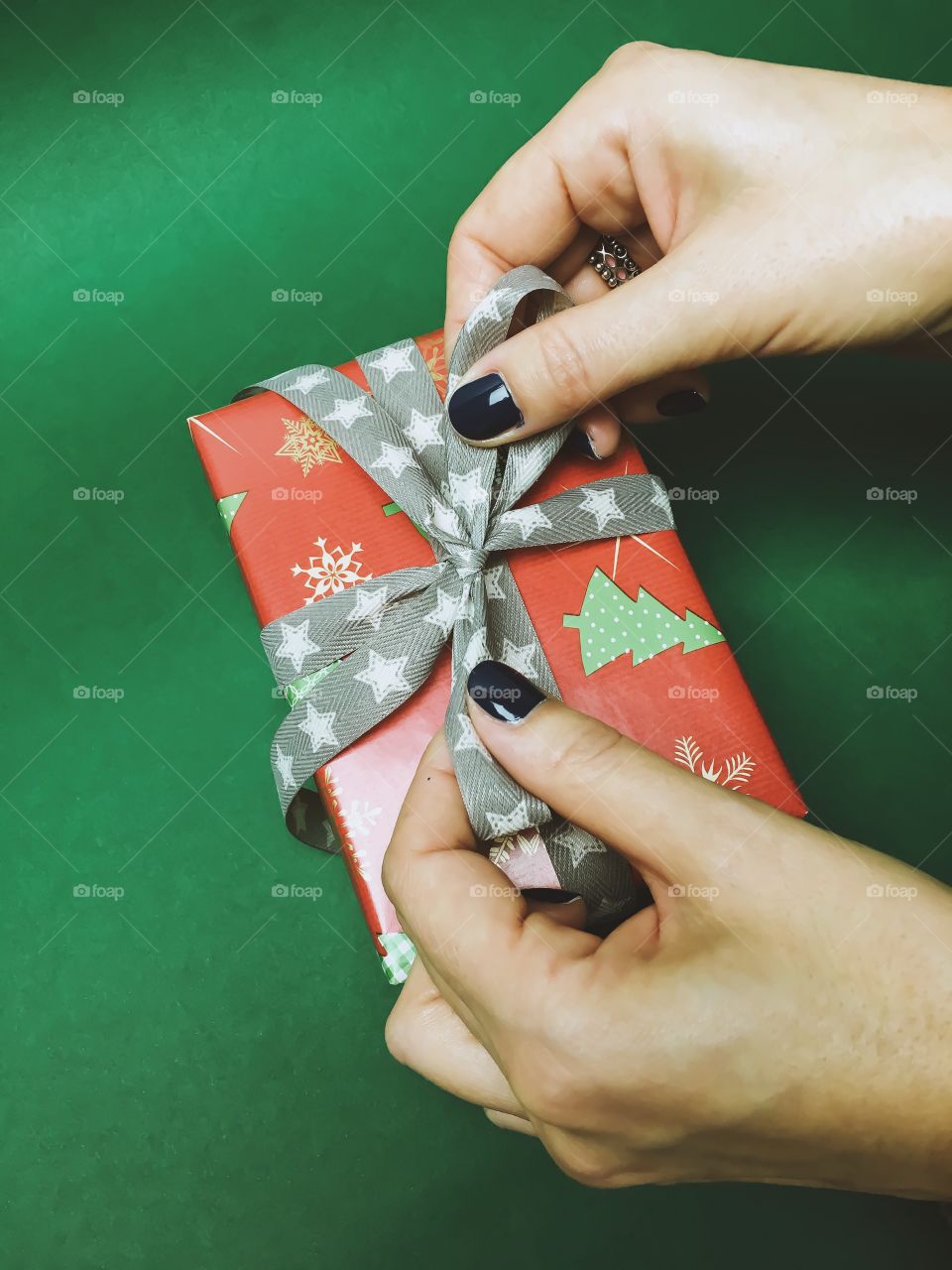 Woman preparing christmas gifts