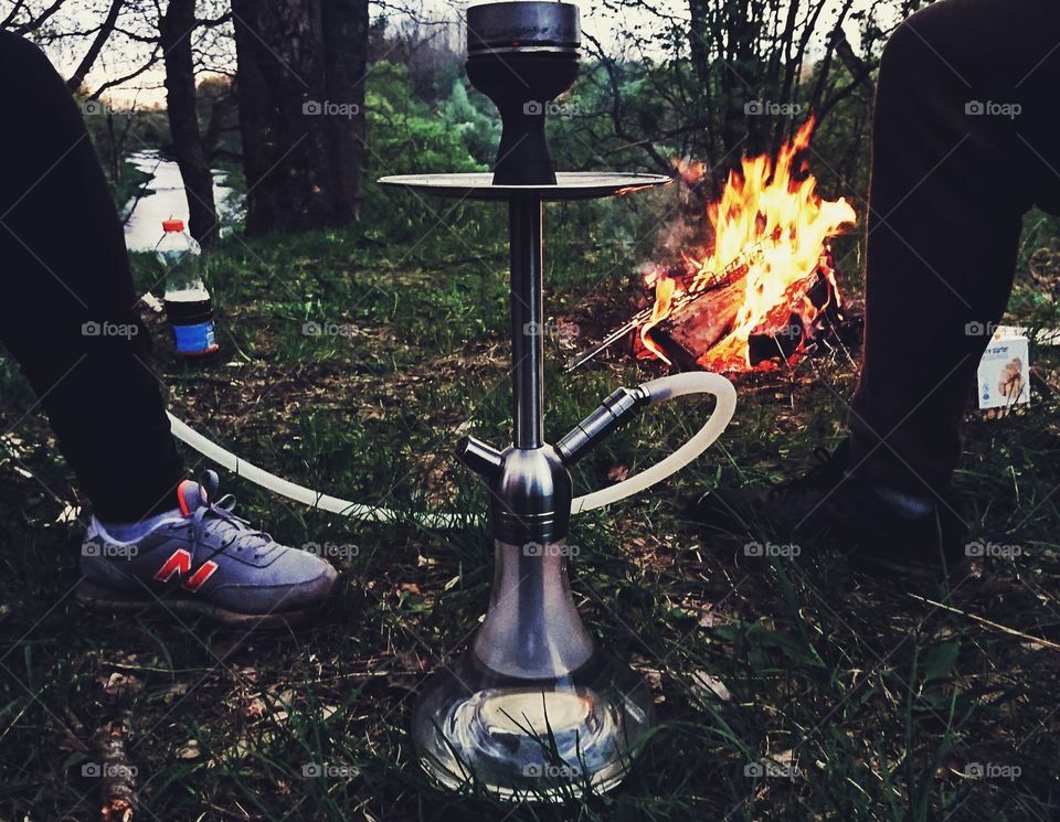 Smoking @Amy deluxe little stick ss13 hookah im the forest. True passion sweet breeze shisha inside. Nice hookah evening session.