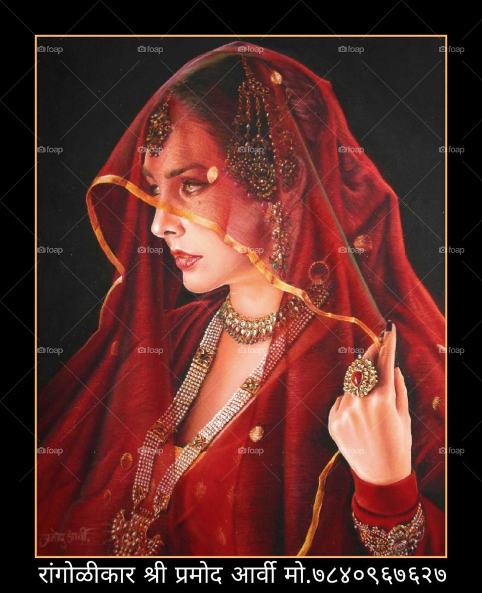 Beautiful art work "Rangoli" with red chalk powder...