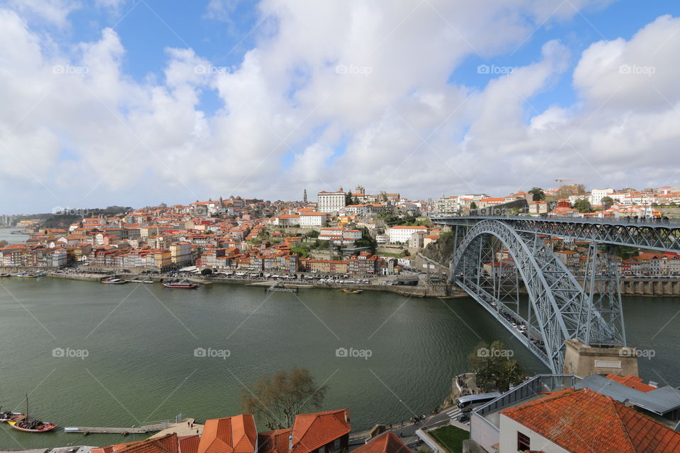 This is the view of the bridge and the river after getting off  the tram in Porto, Portugal. 