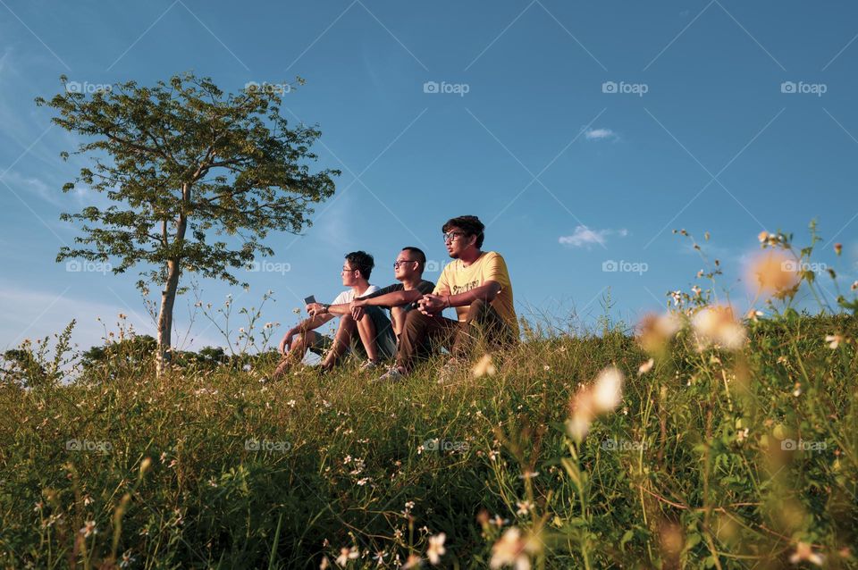 Sitting with best Friends and watching the sunset together 