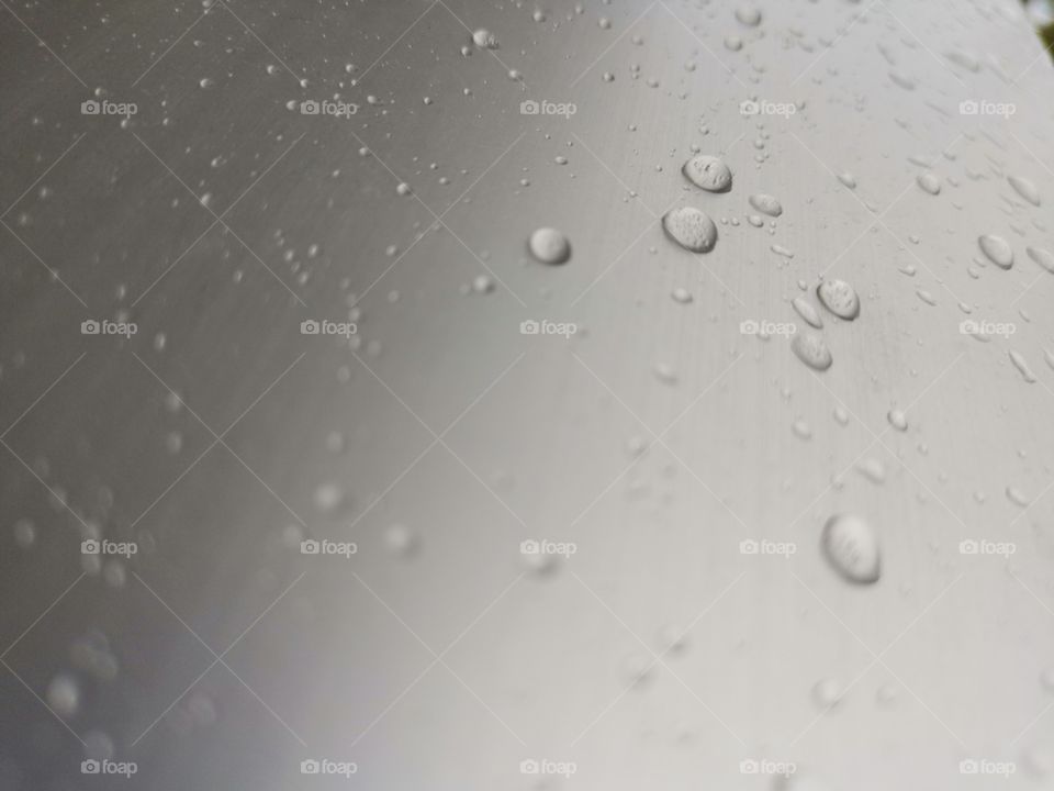 Rain drops vs metal