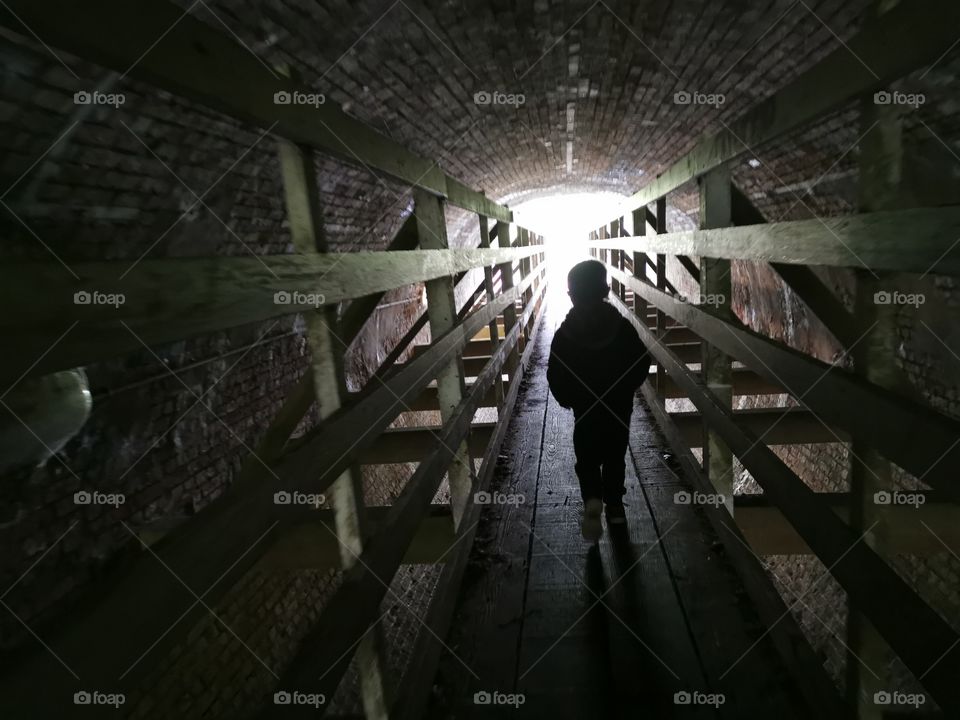 Child in tunnel