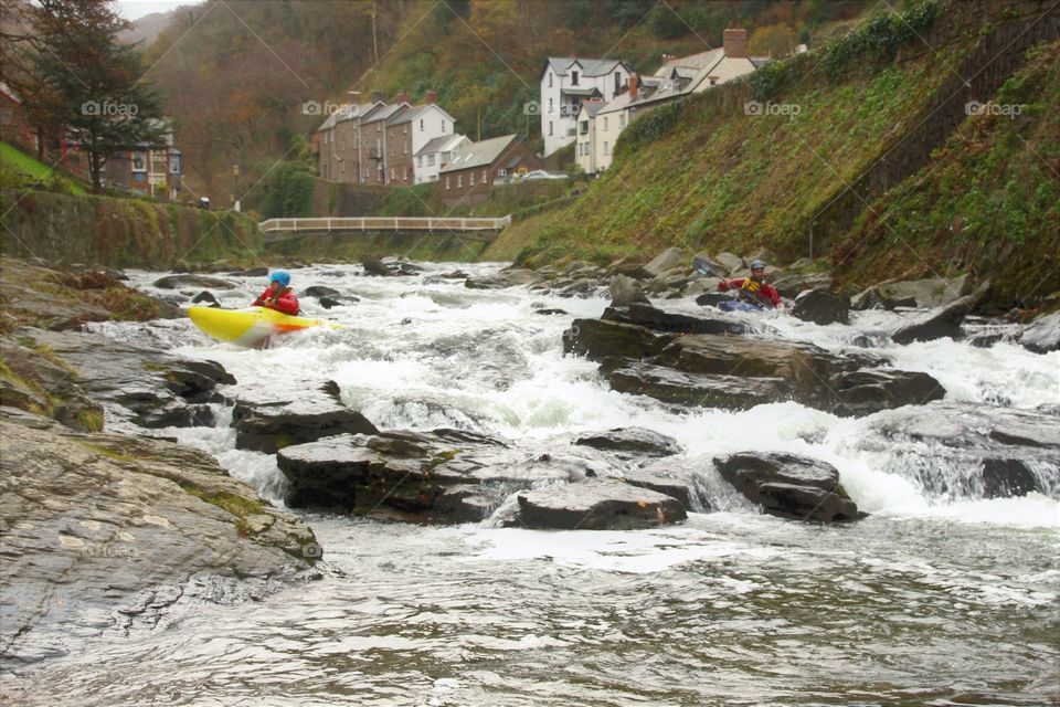 Canoes making their way down the River Lyn