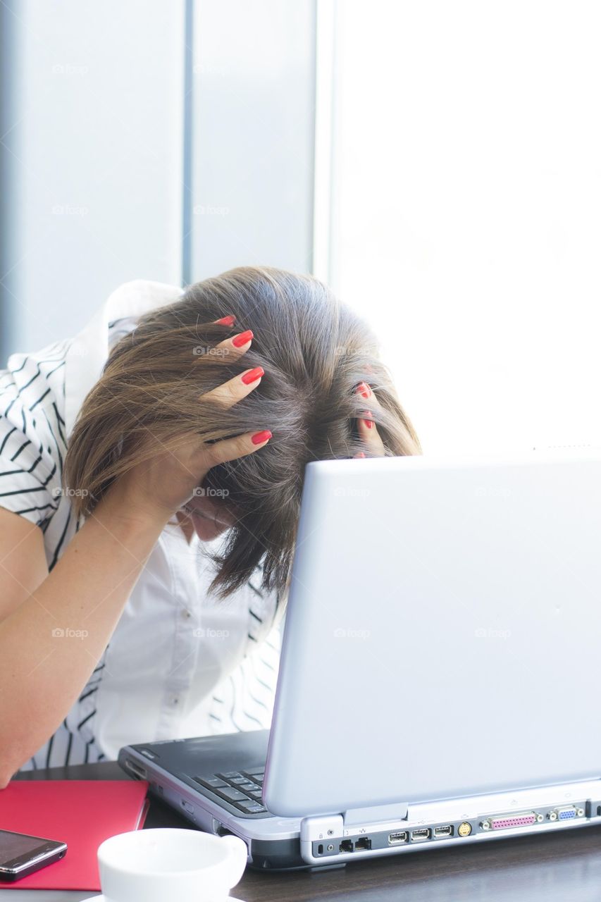 stressed woman at work