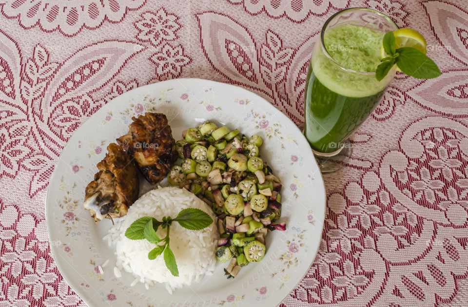 Dinner Meal Of Chicken, Rice, Vegetables And Green Juice