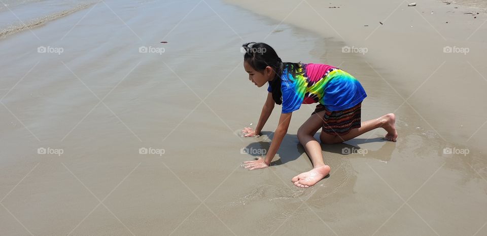 Girl On Sandy Beach