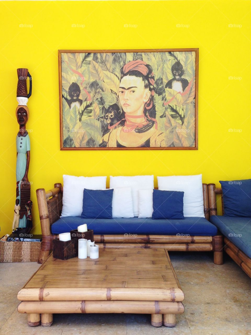 Frida Kahlo on Yellow. Bright yellow living room in the Yucatan