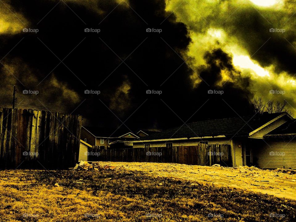 fire raging behind a building