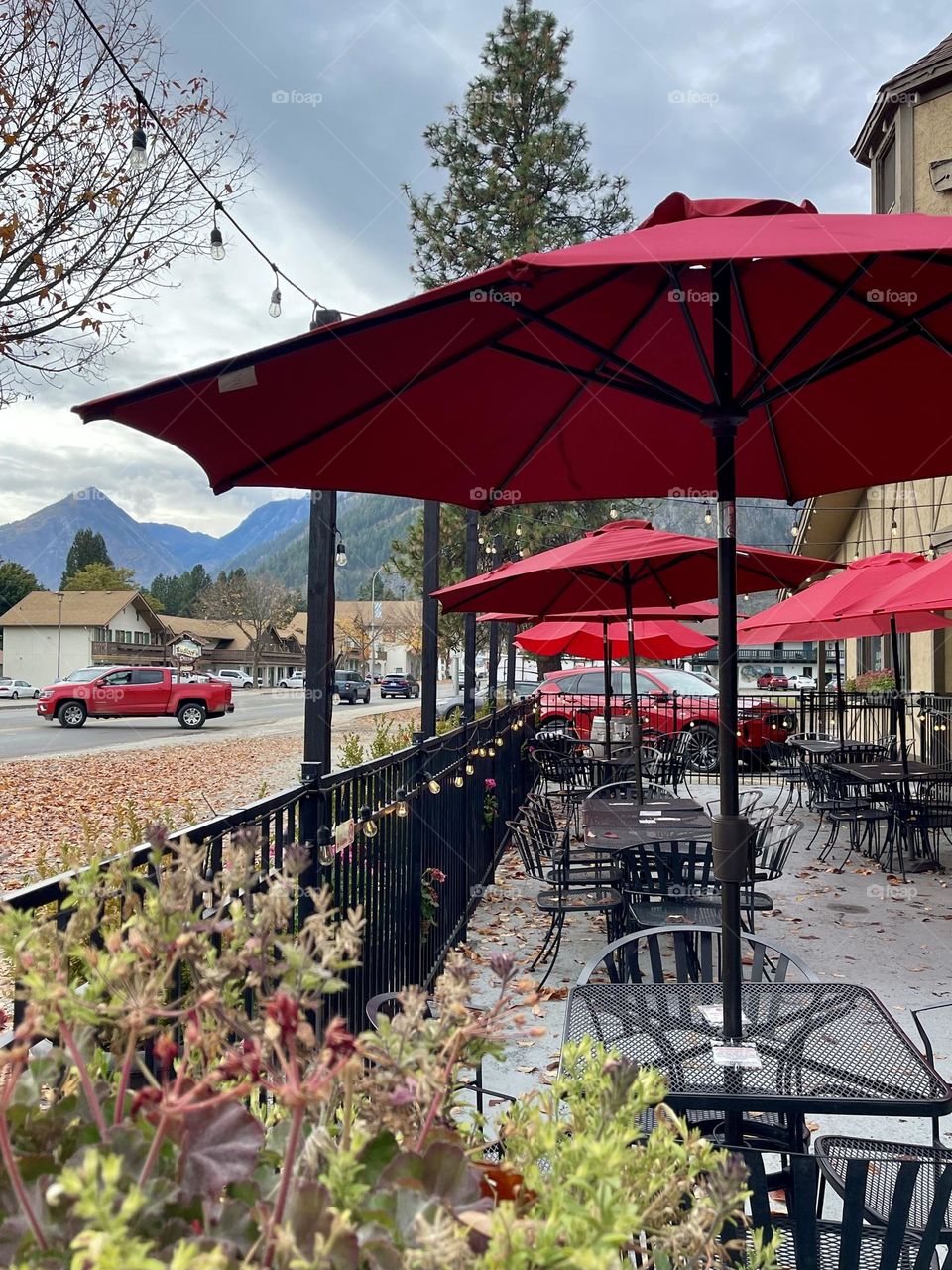 Outdoor cafe with red umbrellas 