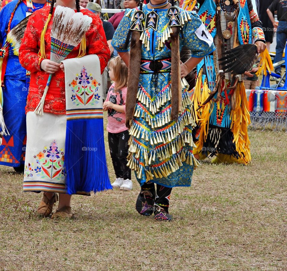 Celebrations Unveiled - Celebrating, families, entertainment, competition, closeup, dance, costume, colorful, vivid, colors, multicolored, people, stepping, vibrant, feathers, headbands, happy, joking hands, participation