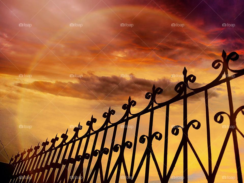 FENCE with dramatic sky