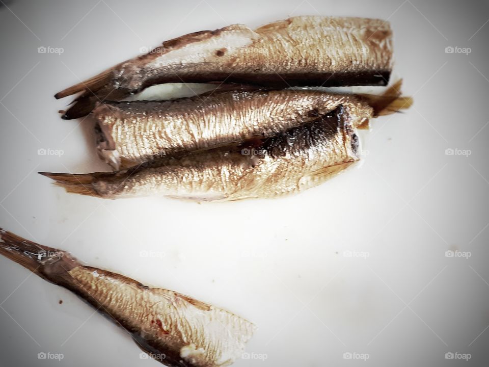 i know... ew. But it is well known and well liked "zakuska"  in eastern Europe,  known for its smokey taste and soft texture. Sprats in oil.