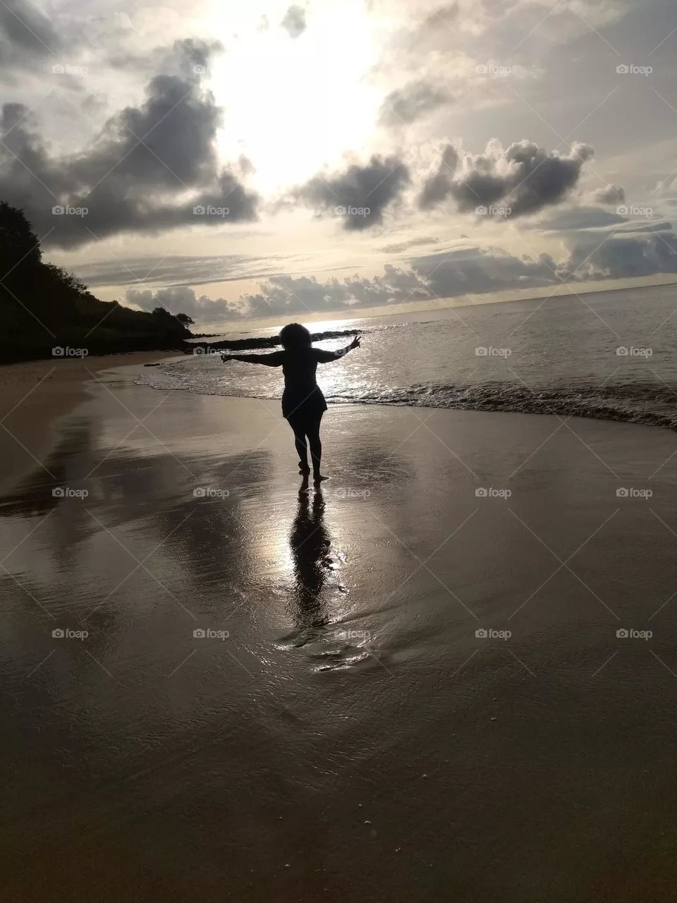 praia e por do sol