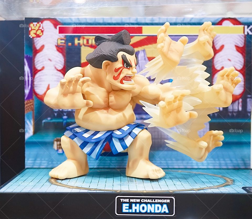 BANGKOK - MAY 5, 2018 : Portrait of E.Honda mascot to promote the game in Thailand Toy Expo 2016. He is a character from Street Fighter Game. His signature move is hundred hand slap.