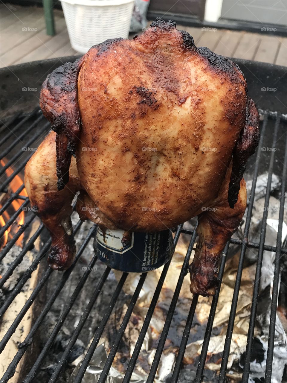 Whole chicken barbecuing 