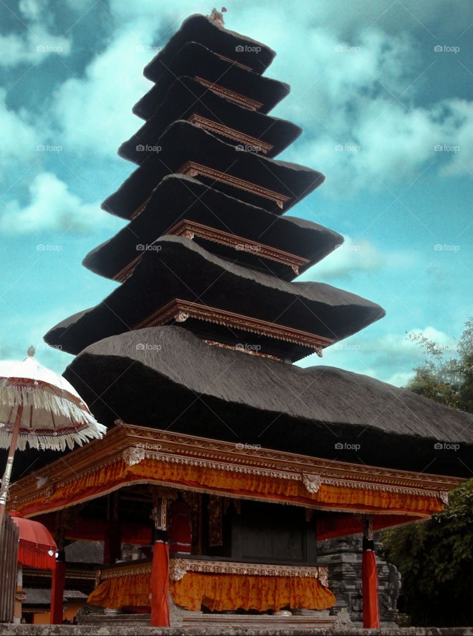 this building is called pura in Bali, is a place where all Hinduism Balinese people are going to praying..