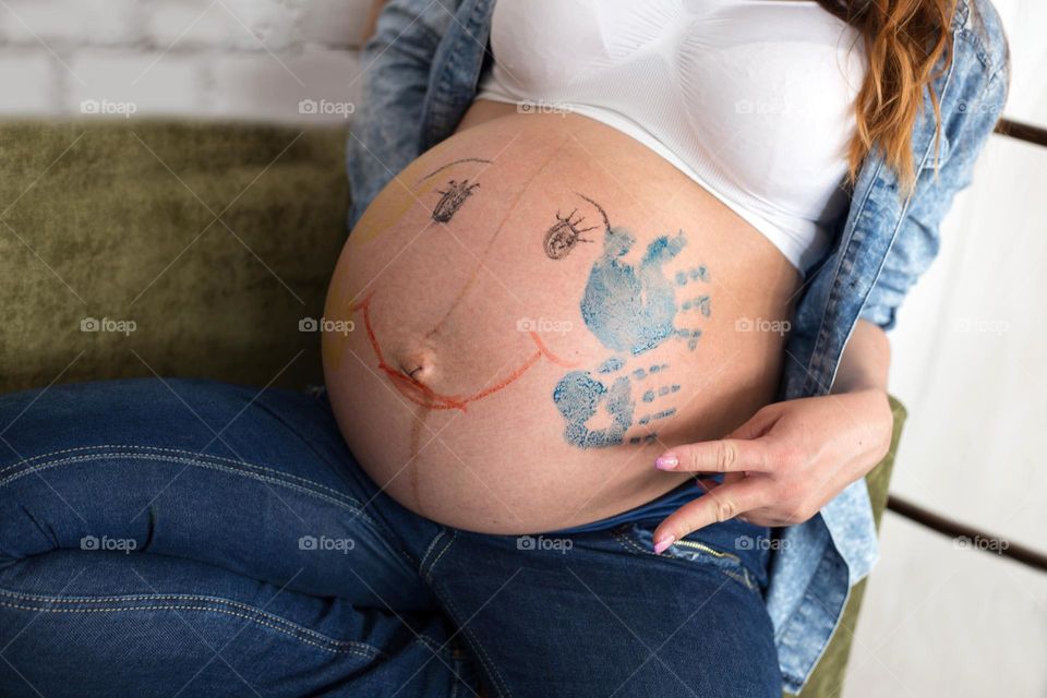 Belly of woman pregnant with twins 