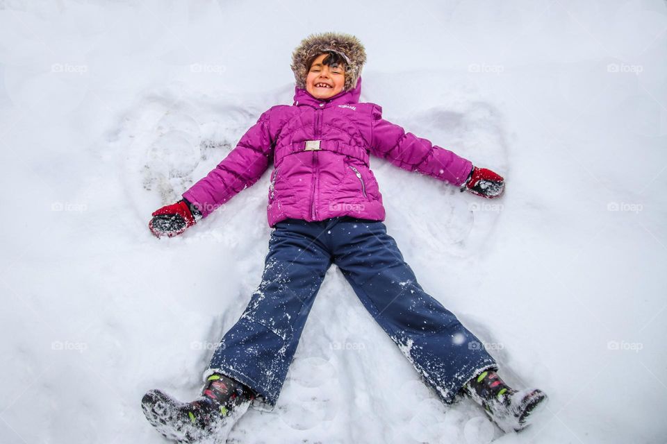 Making snow angel