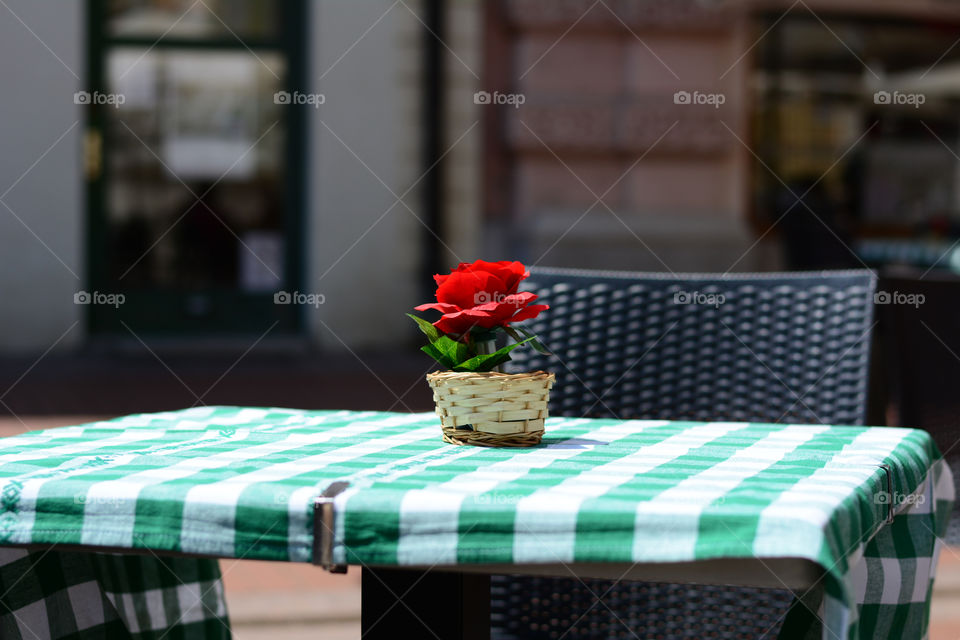 Artificial flower on the table