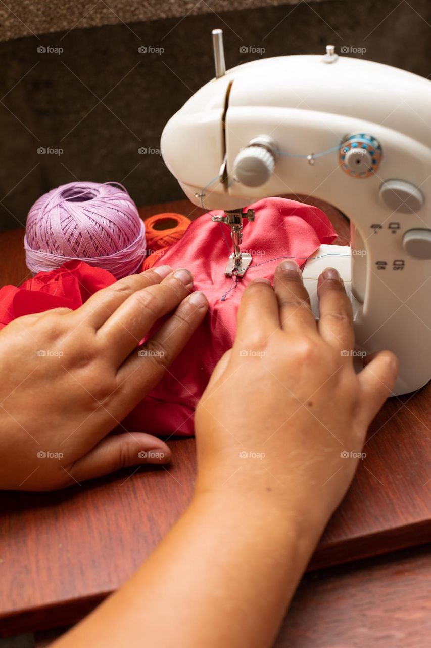 Working at the sewing machine