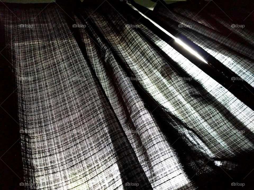 Dark Curtains letting in Light