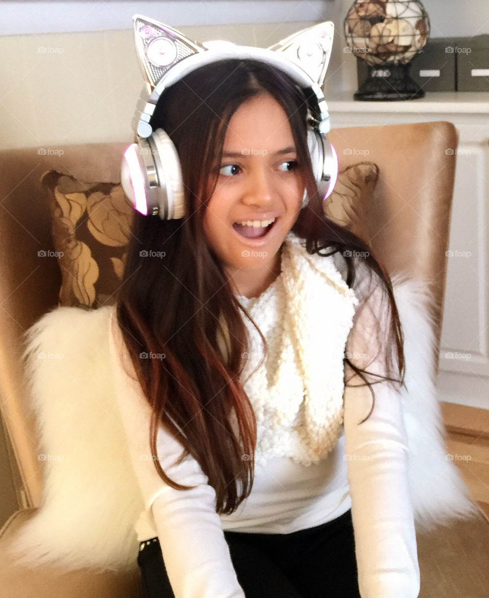 Excited to be using her new headphones from Brookstone. Ariana Grande cat ear headphones.