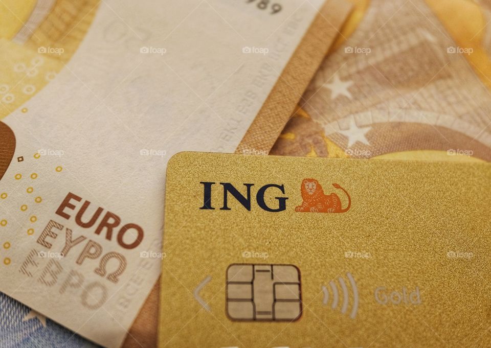 ING credit card and euro banknotes