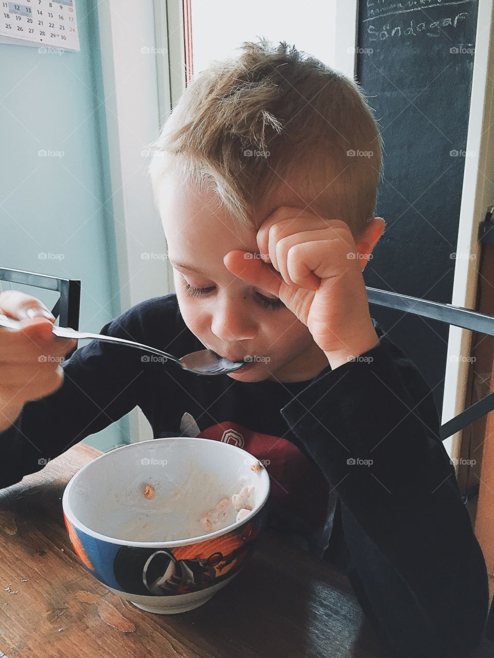 Boy eating breakfast