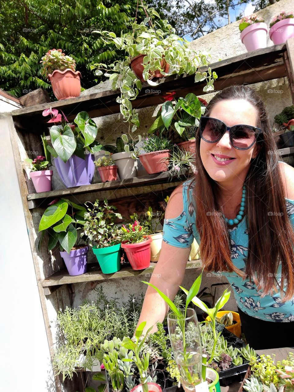 woman with lots of plants