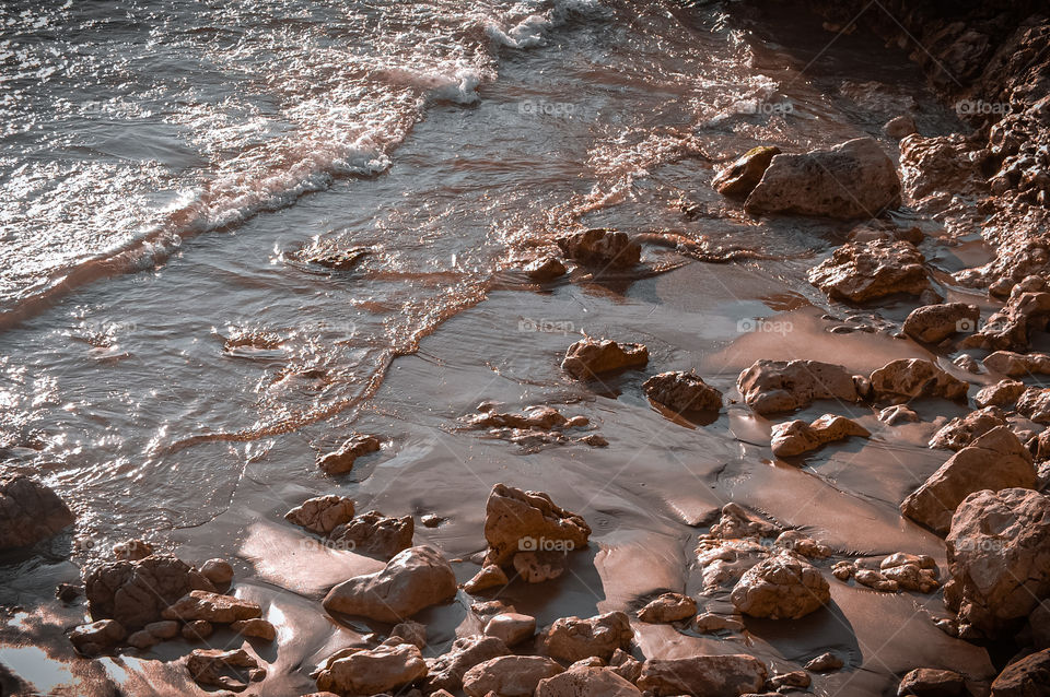Clase-Up of a beach coast with rocks 