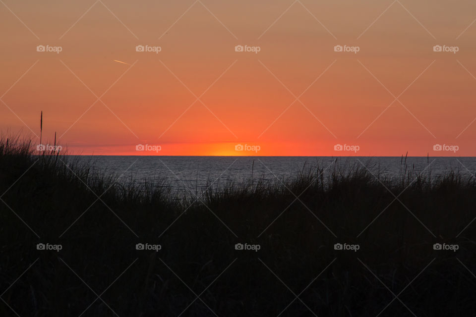 Colorful sunset by the ocean 