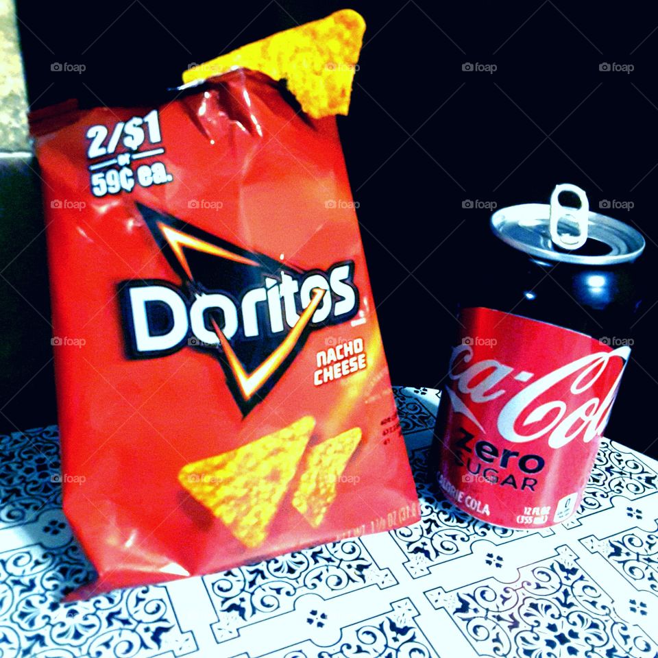Break time with     Doritos and Coca-Cola