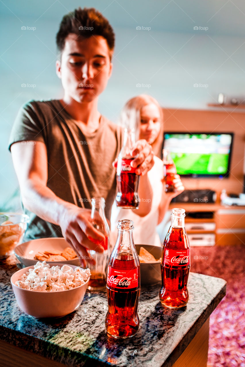 Enjoying the game with Coca-Cola