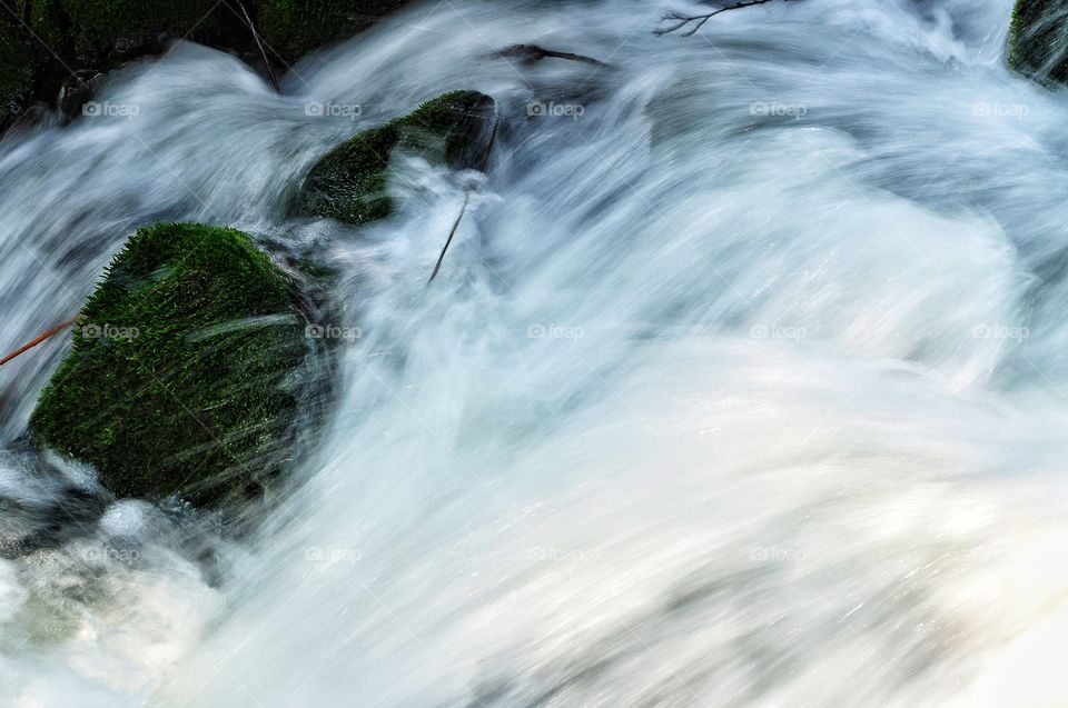 water in motion - river with waterfall