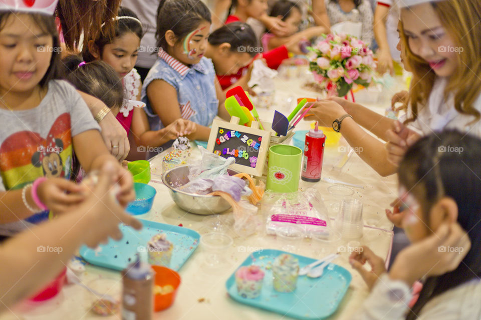 Kids doing some handcraft activities. fun learninf for children day