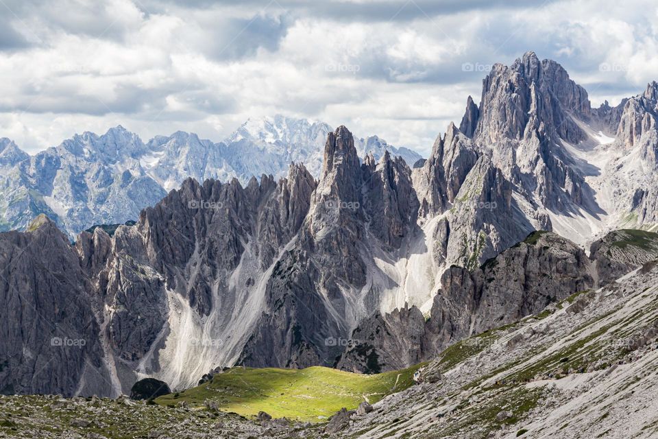 Unique dramatic mountain peaks in the beautiful national park Tre Cime in the Dolomites Italy 