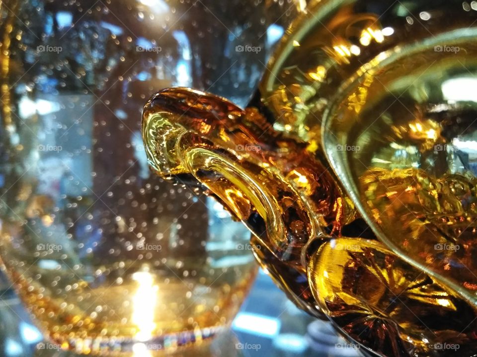 Stunning amber glass collection under a perfect golden light.