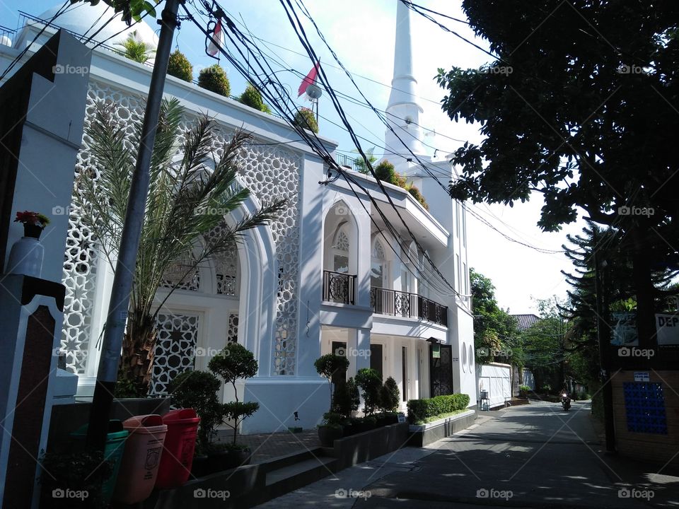 the mosque is a lot of white color and nice architecture with flower carvings, and the mosque is very clean