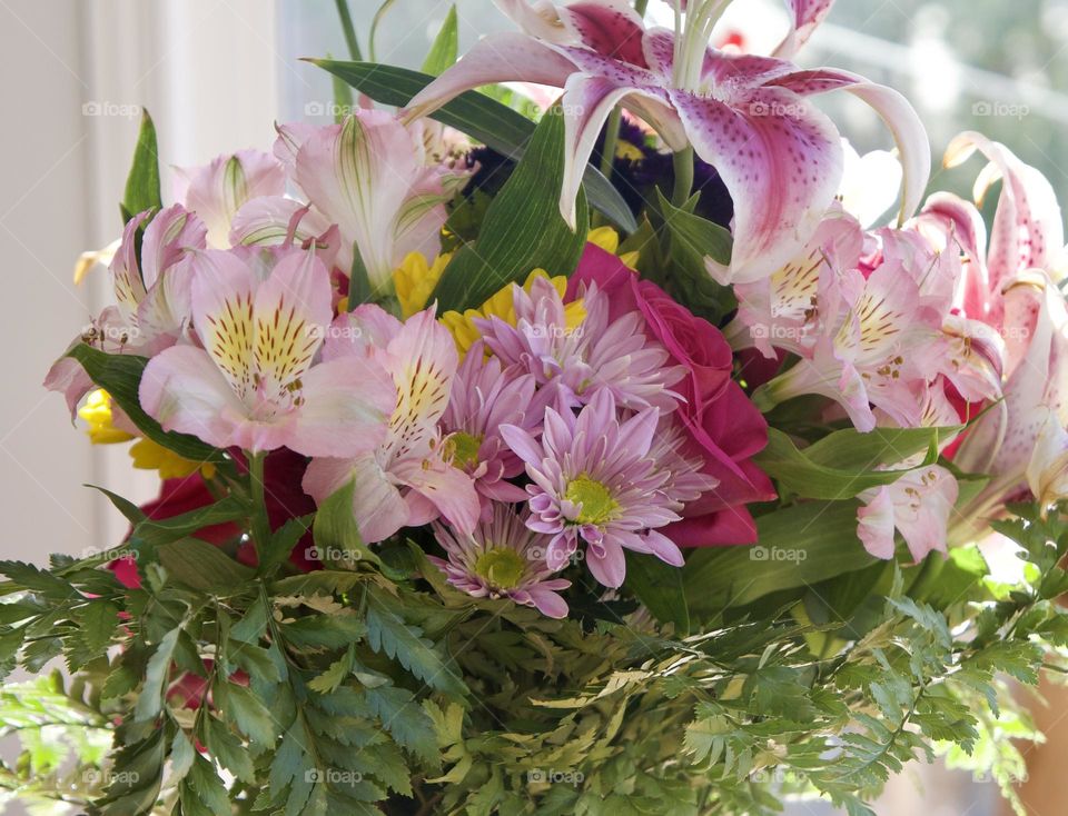 Lilies, carnations and roses.