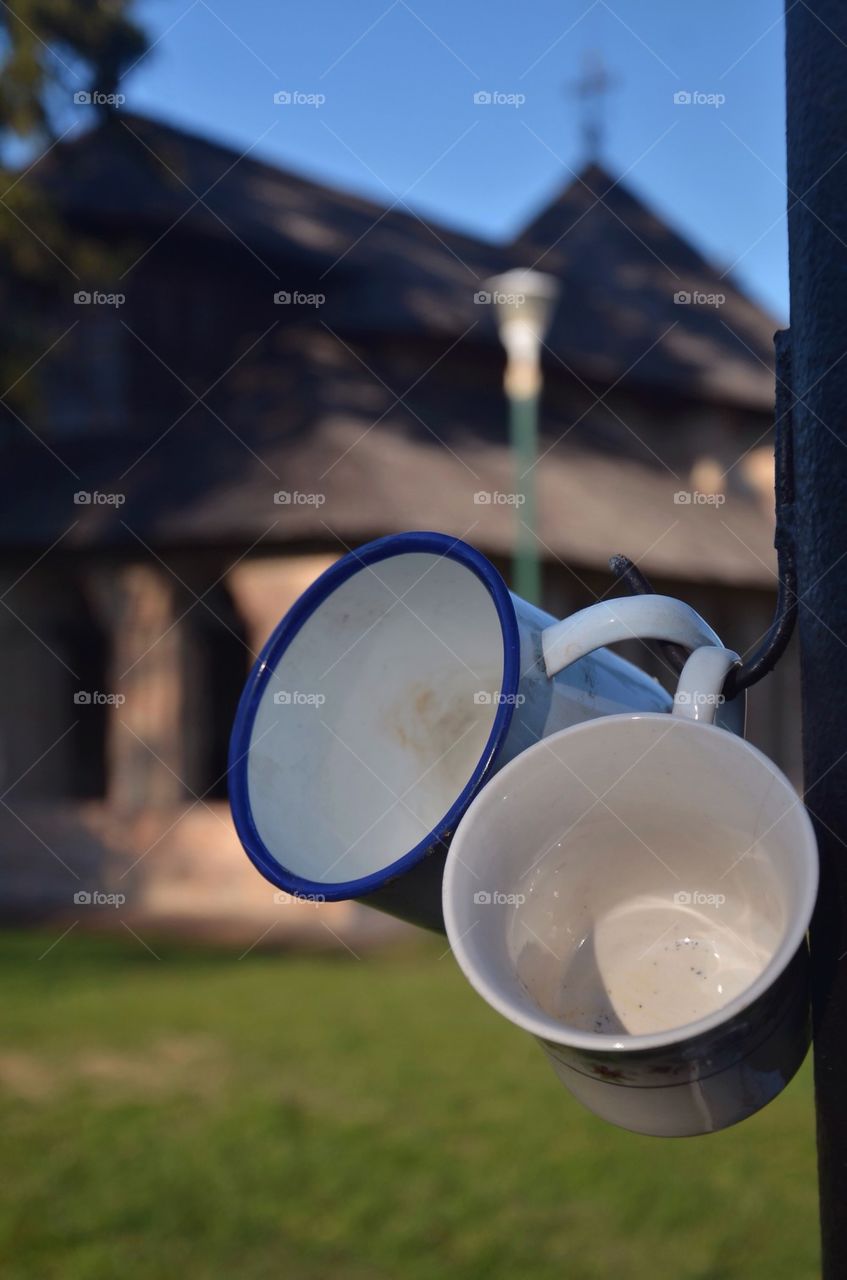 two cups hanging out of a well, Balteni church, Ilfov