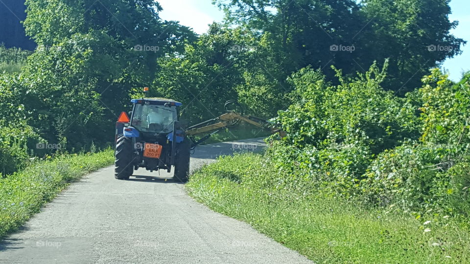 tractor mowing