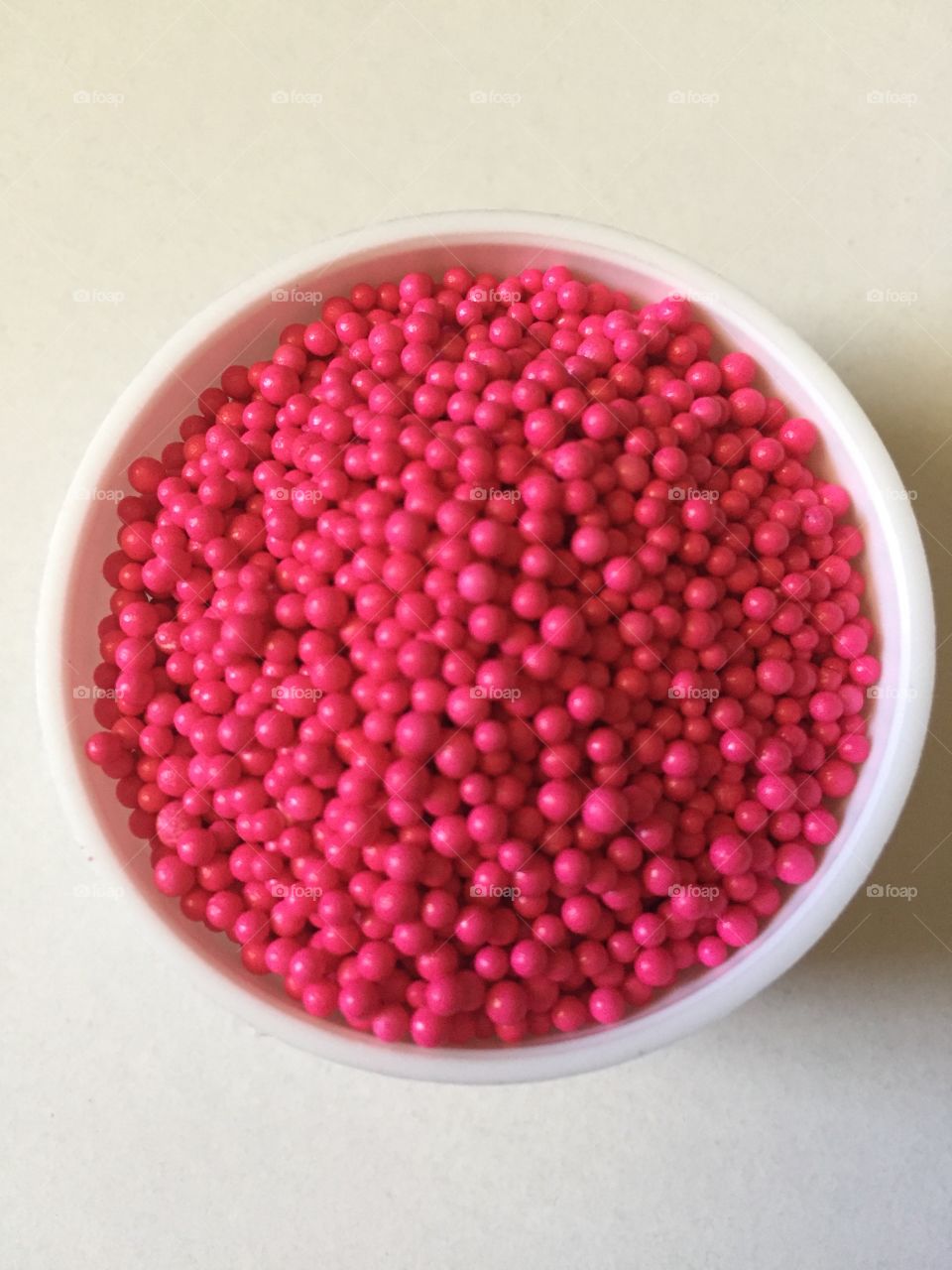 Pink sprinkles in a cup