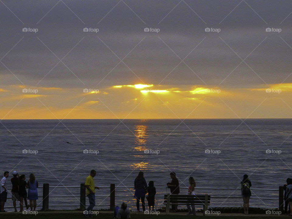 Watching sunset at La Jolla beach in San Diego