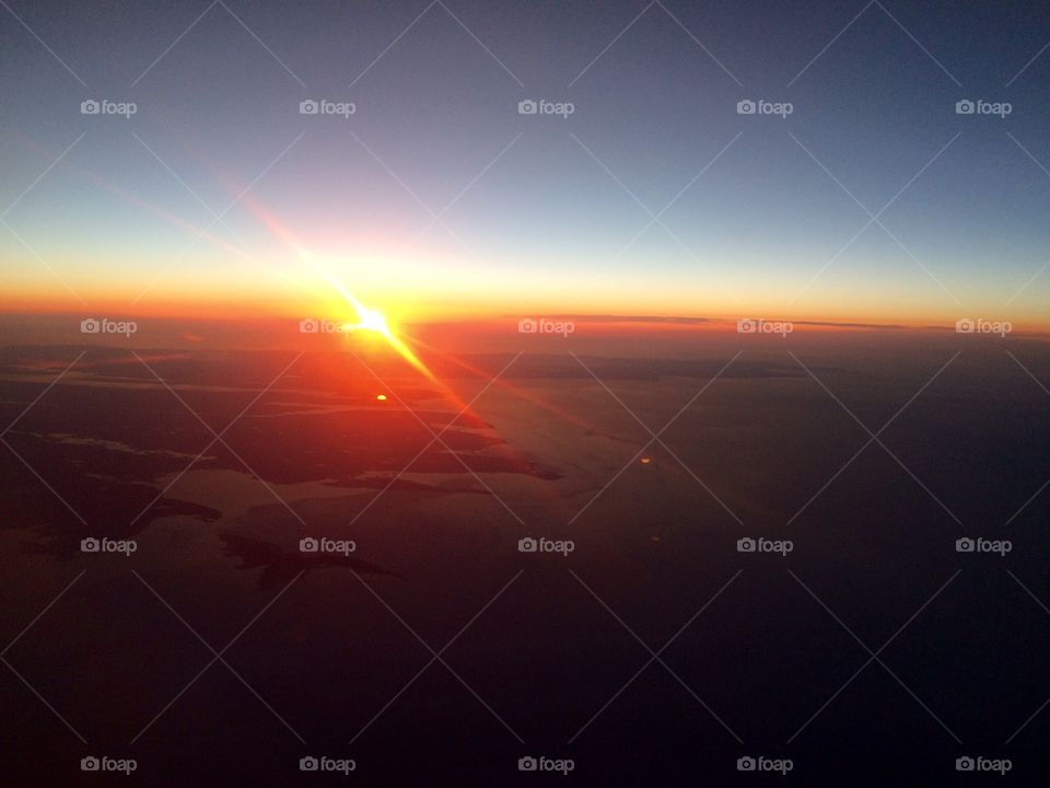 Sunset over Nova Scotia. Watching the sun set from the plane 