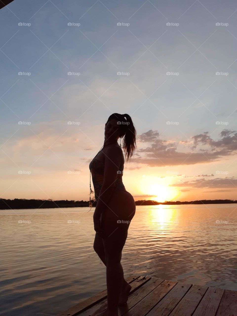 shadow of a woman in the sunset