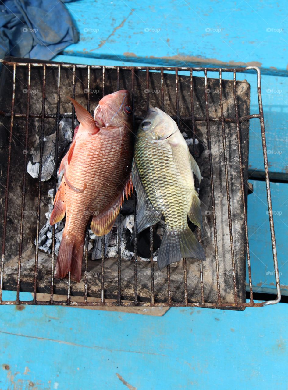 Cooking our fresh catch on the boat! Sine Saloum, Senegal 